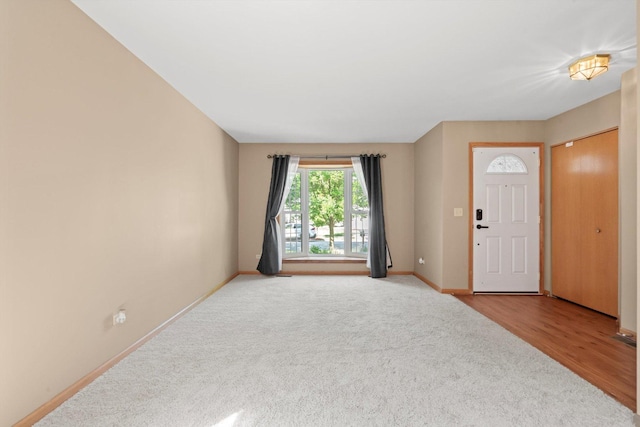 179 Briarcliff Ct, Romeoville, IL 60446 - carpeted foyer entrance featuring baseboards
