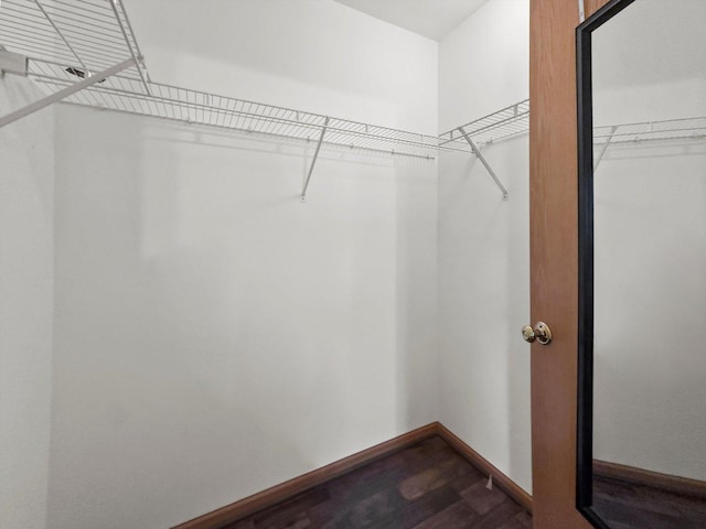179 Briarcliff Ct, Romeoville, IL 60446 - walk in closet featuring dark wood-style flooring