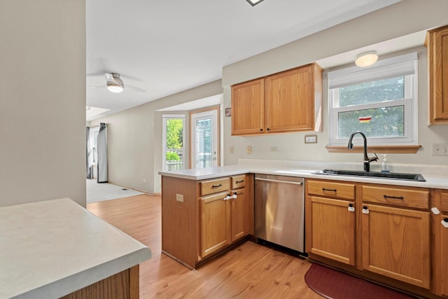 179 Briarcliff Ct, Romeoville, IL 60446 - kitchen featuring stainless steel dishwasher, a peninsula, light wood-style floors, and light countertops