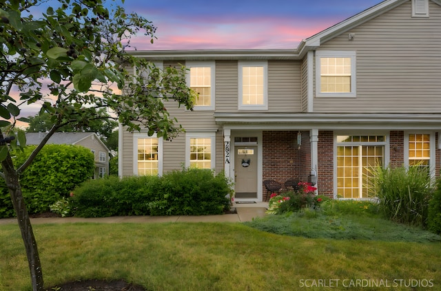 282 Whitfield Dr Unit A, Sugar Grove, IL 60554 - traditional home with a yard and brick siding