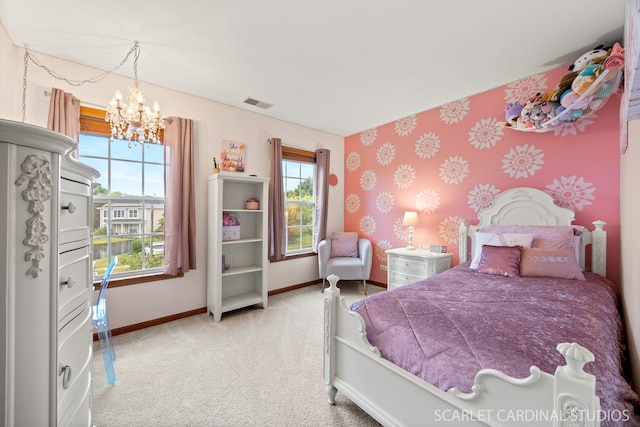 282 Whitfield Dr Unit A, Sugar Grove, IL 60554 - bedroom with wallpapered walls, light carpet, and a chandelier