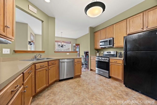 282 Whitfield Dr Unit A, Sugar Grove, IL 60554 - kitchen with stainless steel appliances, a chandelier, light countertops, and light tile patterned floors
