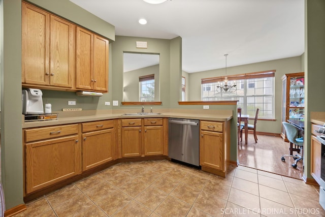 282 Whitfield Dr Unit A, Sugar Grove, IL 60554 - kitchen featuring stainless steel dishwasher, light countertops, a chandelier, light tile patterned floors, and a peninsula