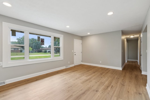 6282 Schaumburg Ln, Roscoe, IL 61073 - unfurnished room featuring light wood-style flooring and recessed lighting