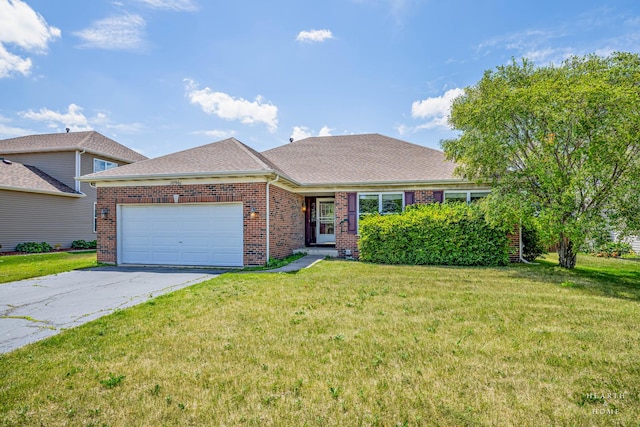 10961 Preston Pkwy, Huntley, IL 60142 - view of front of property with a front yard, a garage, and asphalt driveway