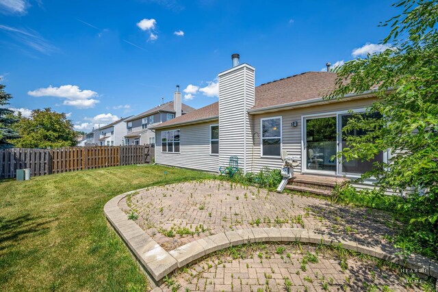 10961 Preston Pkwy, Huntley, IL 60142 - rear view of property with a patio area, a chimney, and a shingled roof