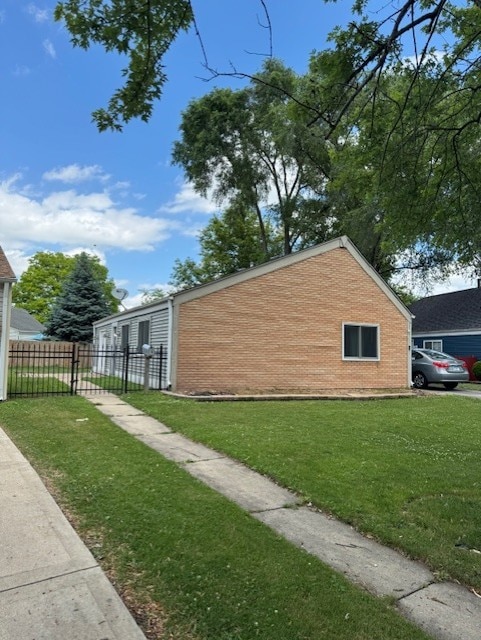 5 Denham Dr, Montgomery, IL 60538 - view of property exterior featuring brick siding