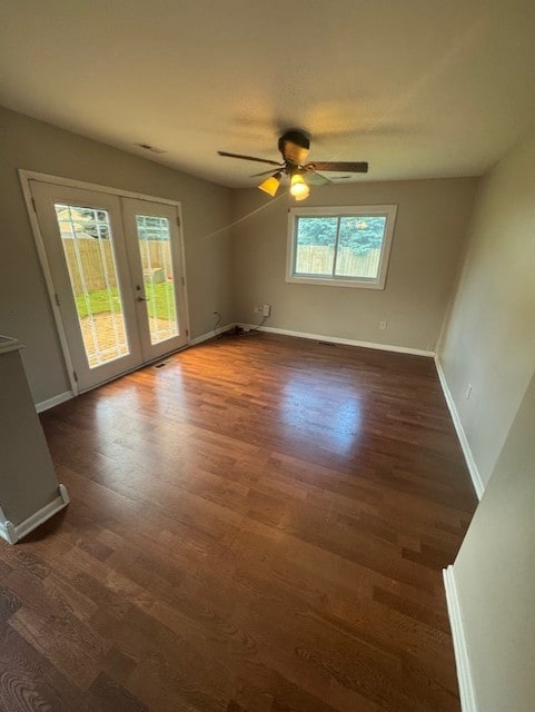 5 Denham Dr, Montgomery, IL 60538 - spare room with dark wood-style floors, french doors, and ceiling fan