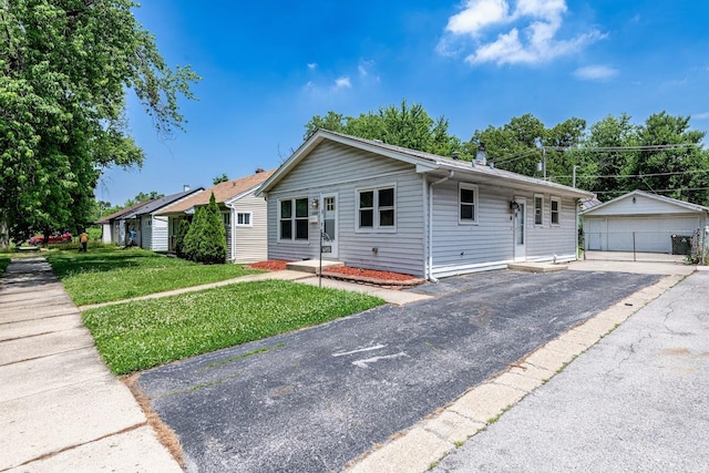 16955 Trapet Ave, Hazel Crest, IL 60429 - ranch-style house featuring an outdoor structure, a front yard, and a detached garage