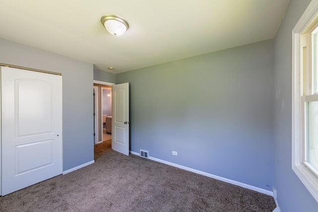 16955 Trapet Ave, Hazel Crest, IL 60429 - unfurnished bedroom with carpet and a closet