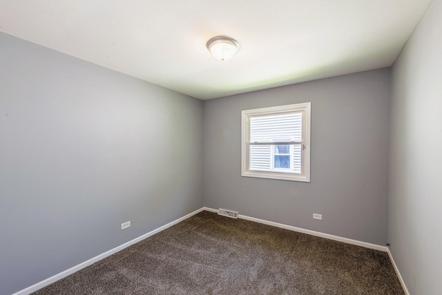 16955 Trapet Ave, Hazel Crest, IL 60429 - unfurnished room featuring dark colored carpet and baseboards