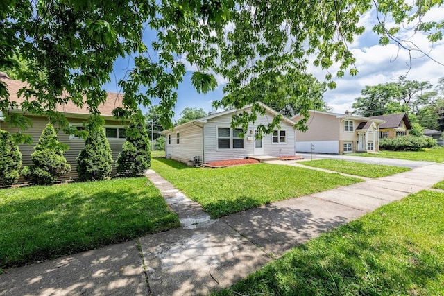 16955 Trapet Ave, Hazel Crest, IL 60429 - view of front of house with driveway and a front yard
