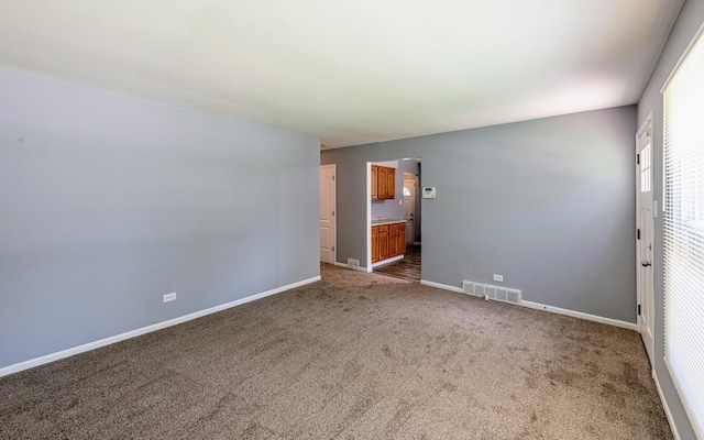 16955 Trapet Ave, Hazel Crest, IL 60429 - carpeted empty room with baseboards