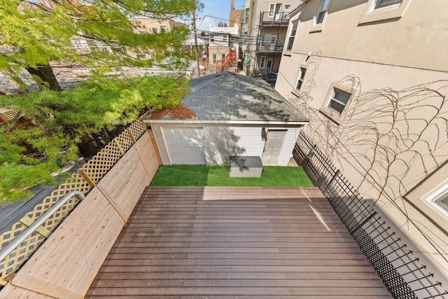 1636 W Huron St, Chicago, IL 60622 - wooden deck featuring an outdoor structure and a fenced backyard