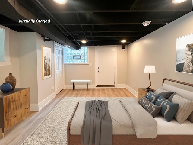 4409 S Prairie Ave, Chicago, IL 60653 - bedroom featuring light wood finished floors and baseboards