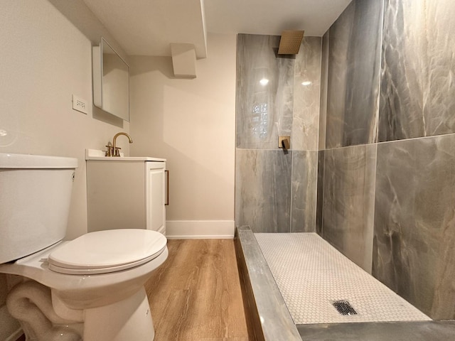 4409 S Prairie Ave, Chicago, IL 60653 - full bathroom with a walk in shower, wood finished floors, and vanity