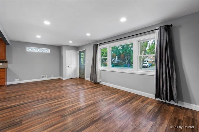 206 N Broadview Ave, Lombard, IL 60148 - unfurnished living room featuring dark wood-style flooring and recessed lighting