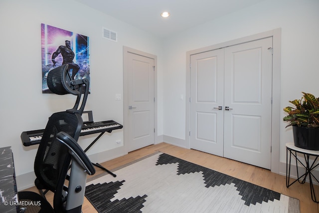 1221 E 46th St Unit 1, Chicago, IL 60653 - exercise area featuring light wood-style flooring and recessed lighting
