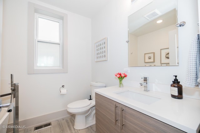 1221 E 46th St Unit 1, Chicago, IL 60653 - bathroom featuring vanity and toilet