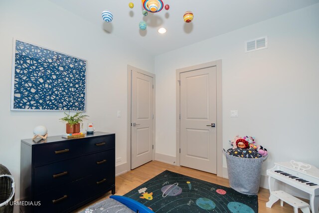 1221 E 46th St Unit 1, Chicago, IL 60653 - bedroom featuring light wood-style floors