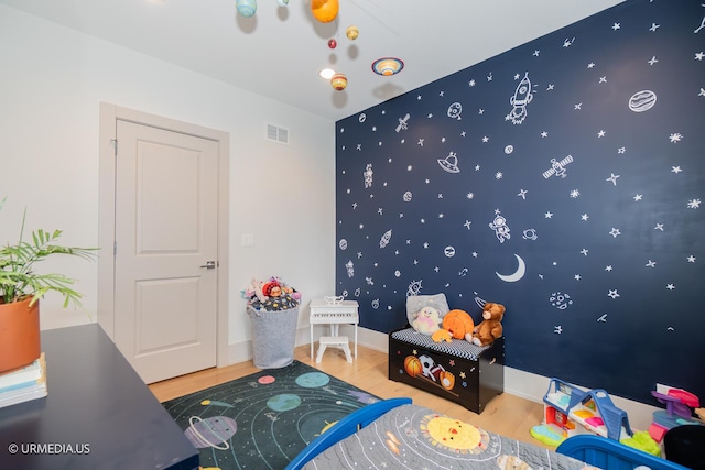 1221 E 46th St Unit 1, Chicago, IL 60653 - recreation room featuring wood finished floors