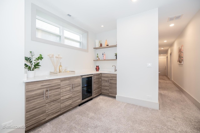 1221 E 46th St Unit 1, Chicago, IL 60653 - indoor wet bar featuring wine cooler, light carpet, and recessed lighting
