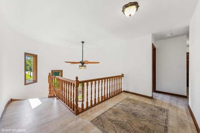 5525 Lee Ave, Downers Grove, IL 60515 - hallway with light wood finished floors and an upstairs landing