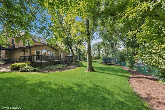 5525 Lee Ave, Downers Grove, IL 60515 - view of yard with a trampoline and a deck