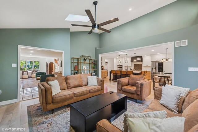 5525 Lee Ave, Downers Grove, IL 60515 - living area with a ceiling fan, light wood-style flooring, high vaulted ceiling, and recessed lighting