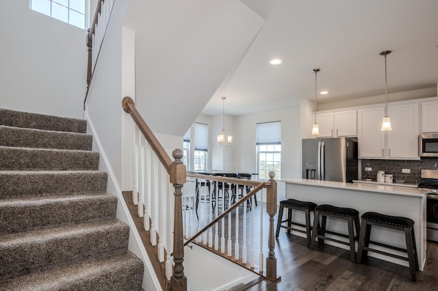 14000 S Sheridan Trl, Homer Glen, IL 60491 - staircase featuring wood finished floors, recessed lighting, and a chandelier