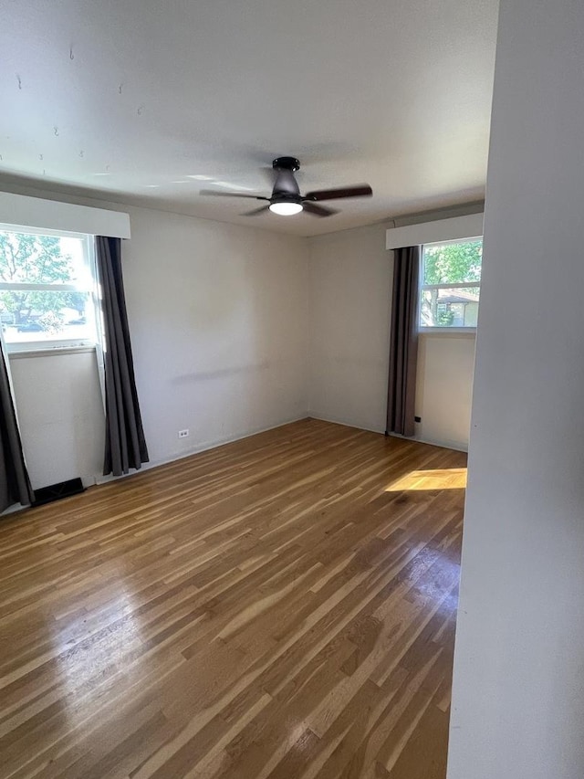 12813 E Playfield Dr, Crestwood, IL 60418 - empty room with ceiling fan and wood finished floors