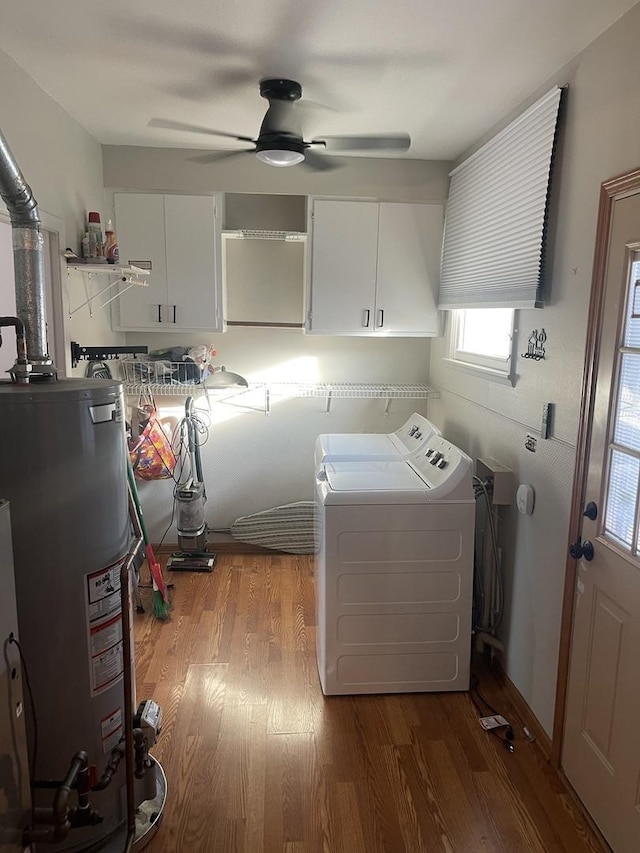 12813 E Playfield Dr, Crestwood, IL 60418 - laundry area featuring cabinet space, water heater, washer and clothes dryer, wood finished floors, and a ceiling fan