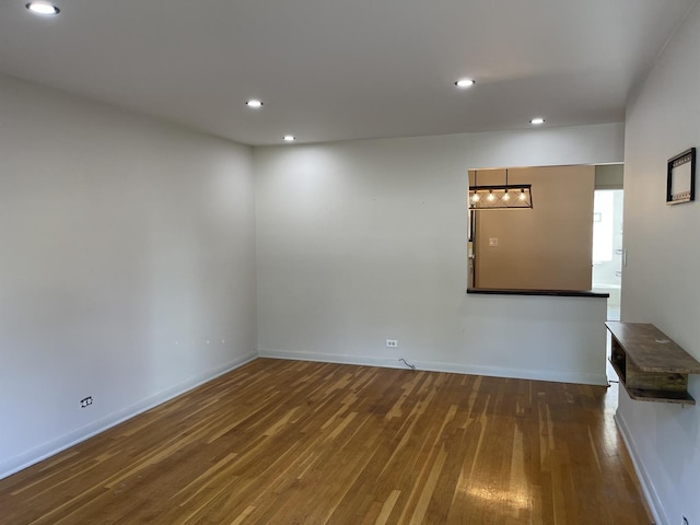 12813 E Playfield Dr, Crestwood, IL 60418 - spare room with wood finished floors and recessed lighting
