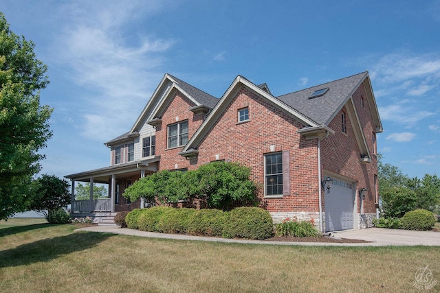 1019 Freedom Cir, Sycamore, IL 60178 - view of front of house with brick siding, a garage, a front lawn, concrete driveway, and covered porch