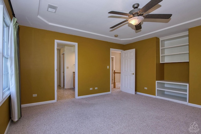 1019 Freedom Cir, Sycamore, IL 60178 - unfurnished bedroom featuring carpet floors and a ceiling fan