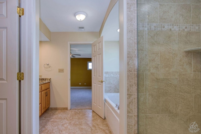 1019 Freedom Cir, Sycamore, IL 60178 - bathroom featuring vanity, a bath, tile patterned flooring, ceiling fan, and a shower