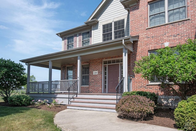 1019 Freedom Cir, Sycamore, IL 60178 - view of front of house with brick siding and covered porch