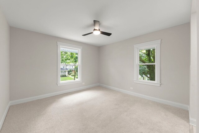 342 Franklin Ave, River Forest, IL 60305 - empty room with light carpet and a ceiling fan