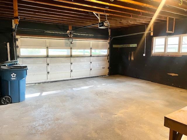 909 N Brinton Ave, Dixon, IL 61021 - garage featuring a garage door opener