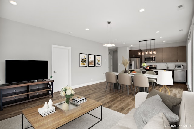 2304 W Jackson Blvd Unit 2W, Chicago, IL 60612 - living area featuring recessed lighting and dark wood-style floors