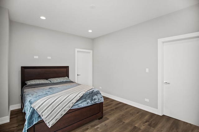 2304 W Jackson Blvd Unit 2W, Chicago, IL 60612 - bedroom with dark wood-style flooring and recessed lighting