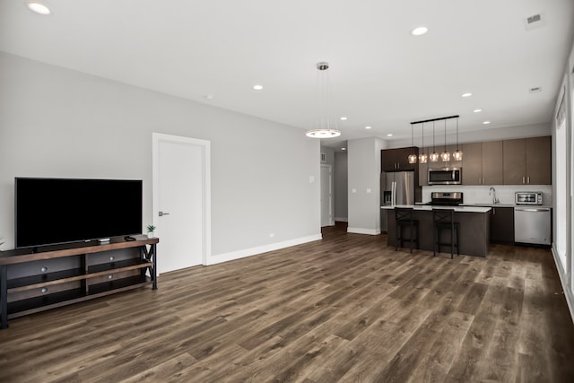2304 W Jackson Blvd Unit 2W, Chicago, IL 60612 - living area with dark wood-style flooring and recessed lighting