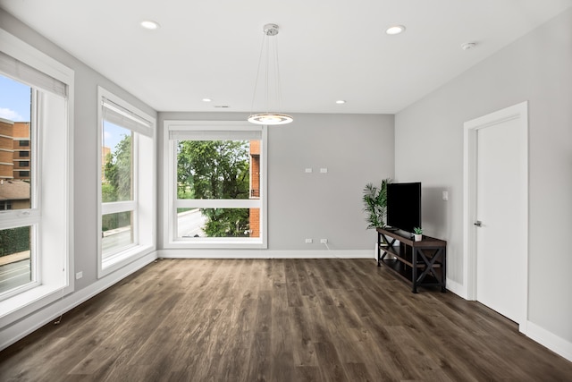 2304 W Jackson Blvd Unit 2W, Chicago, IL 60612 - unfurnished living room featuring dark wood-type flooring and recessed lighting