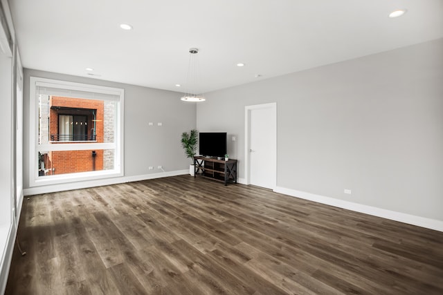 2304 W Jackson Blvd Unit 2W, Chicago, IL 60612 - unfurnished living room featuring dark wood finished floors and recessed lighting