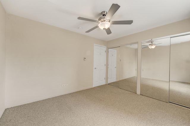 310 Lathrop Ave Unit 411, Forest Park, IL 60130 - unfurnished bedroom featuring multiple closets, carpet floors, and a ceiling fan