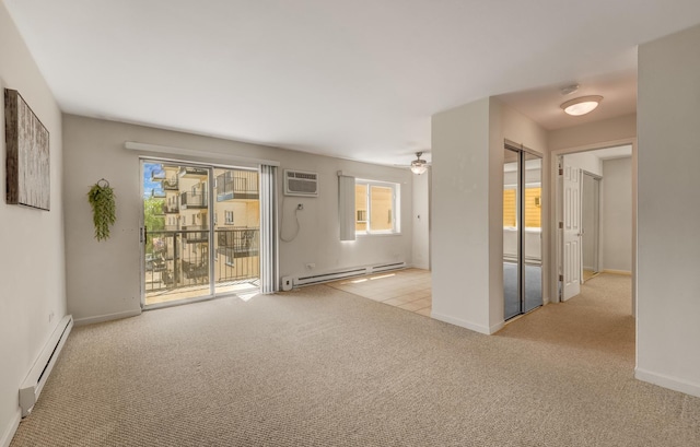 310 Lathrop Ave Unit 411, Forest Park, IL 60130 - empty room featuring a baseboard heating unit, a wall mounted AC, and carpet