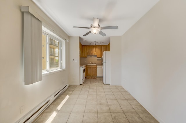 310 Lathrop Ave Unit 411, Forest Park, IL 60130 - unfurnished dining area with a baseboard radiator, a ceiling fan, and light tile patterned flooring