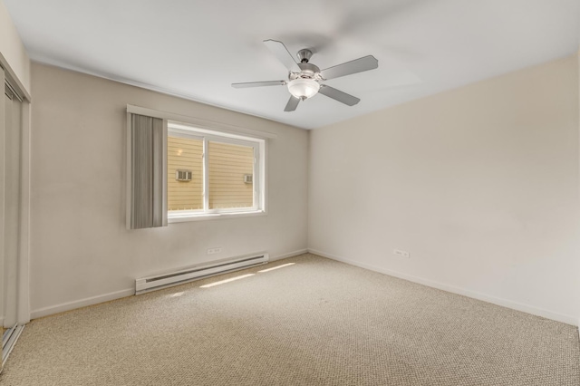 310 Lathrop Ave Unit 411, Forest Park, IL 60130 - spare room with baseboard heating, carpet flooring, and a ceiling fan