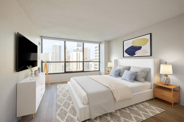 405 N Wabash Ave Unit 3611, Chicago, IL 60611 - bedroom with wood finished floors and baseboards