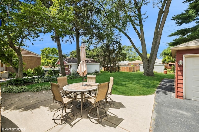 9326 S Millard Ave, Evergreen Park, IL 60805 - view of patio / terrace featuring outdoor dining space and an outdoor structure